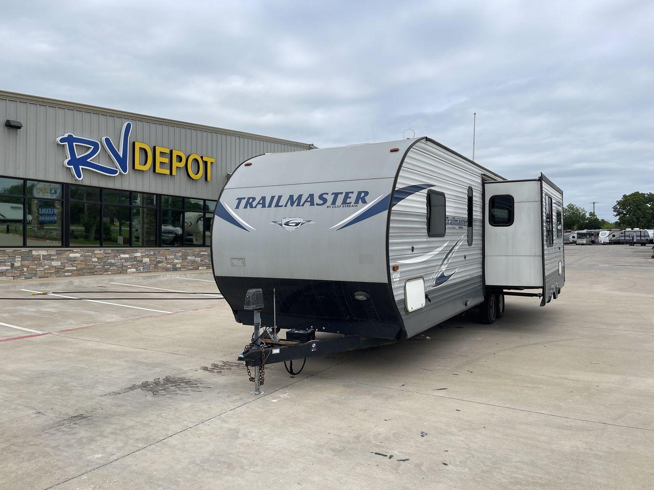 2018 GULFSTREAM TRAILMASTER 262RLS (1NL1GTP2XJ1) , Length: 31.25 ft. | Dry Weight: 6,849 lbs. | Slides: 1 transmission, located at 4319 N Main Street, Cleburne, TX, 76033, (817) 221-0660, 32.435829, -97.384178 - This 2018 Gulf Stream Trailmaster 262RLS travel trailer measures just over 31' in length. It is a dual axle, steel wheel setup with a dry weight of 6,849 lbs and a carrying capacity of 1,421 lbs. With a dry weight of 6,849 lbs., the Trailmaster 262RLS offers easy maneuverability without compromising - Photo #0
