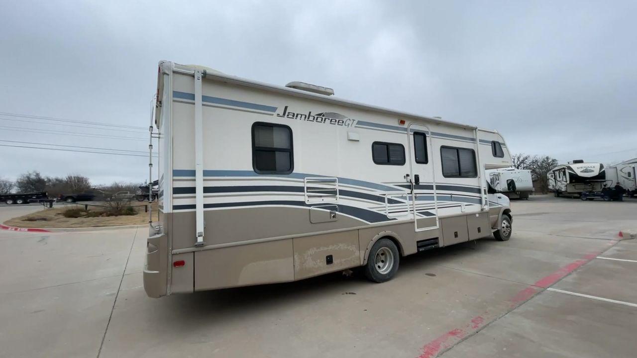 2003 WHITE /brown FLEETWOOD JAMBOREE GT E450 (1FDXE45S93H) with an 6.8L V10 SOHC 20V engine, located at 4319 N Main St, Cleburne, TX, 76033, (817) 678-5133, 32.385960, -97.391212 - Photo #1