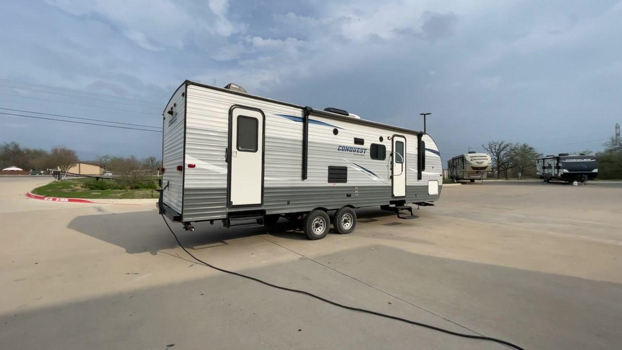 2019 WHITE GULF STREAM CONQUEST 268BH (1NL1G3026K1) , Length: 29.5 ft. | Dry Weight: 5,220 lbs. | Slides: 1 transmission, located at 4319 N Main St, Cleburne, TX, 76033, (817) 678-5133, 32.385960, -97.391212 - Lavish in a cozy trailer when you are out for a camping trip with the whole family in this 2019 Gulf Stream Conquest 268BH Travel Trailer. The measurements of this trailer are 29.6 ft in length, 8 ft in width, 11.1 ft in height, and 6.8 ft in interior height. It has a dry weight of 5,177 lbs with a - Photo #1
