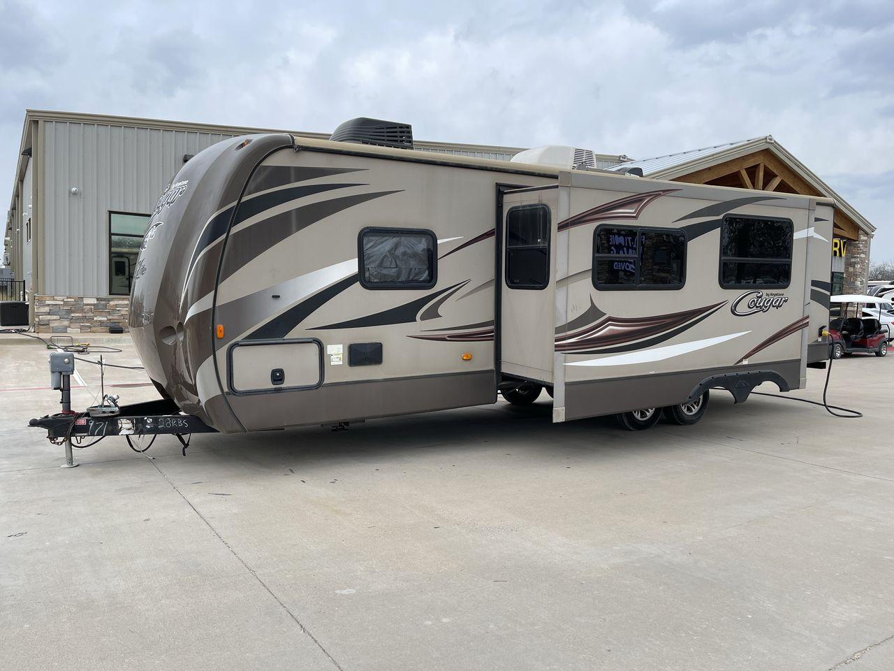 2016 BROWN KEYSTONE COUGAR 28RBS - (4YDT28R23GV) , Length: 32.17 ft. | Dry Weight: 6,115 lbs. | Gross Weight: 8,200 lbs. | Slides: 1 transmission, located at 4319 N Main St, Cleburne, TX, 76033, (817) 678-5133, 32.385960, -97.391212 - Photo #23