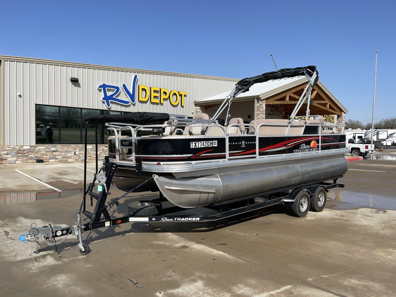 2014 BLACK SUNTRACKER FISHING BARGE 22DLX (BUJ22913D41) , located at 4319 N Main St, Cleburne, TX, 76033, (817) 678-5133, 32.385960, -97.391212 - The 2014 Sun Tracker Fishin' Barge is here to make you happy. This adjustable pontoon boat is great for fishermen and people who love the outdoors. This Fishin' Barge is 21 feet long, so it has plenty of room for all your fishing tools and friends. The boat is built to last, and the Mercury outboar - Photo #0