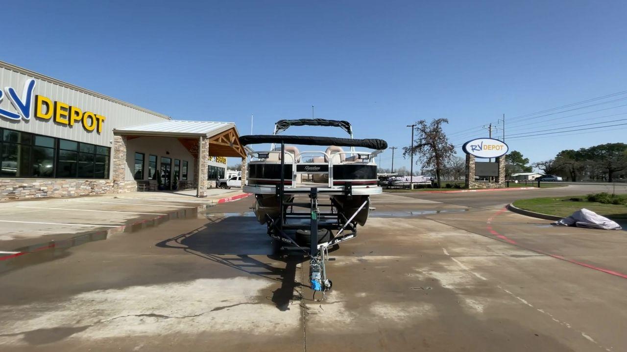2014 BLACK SUNTRACKER FISHING BARGE 22DLX (BUJ22913D41) , located at 4319 N Main St, Cleburne, TX, 76033, (817) 678-5133, 32.385960, -97.391212 - The 2014 Sun Tracker Fishin' Barge is here to make you happy. This adjustable pontoon boat is great for fishermen and people who love the outdoors. This Fishin' Barge is 21 feet long, so it has plenty of room for all your fishing tools and friends. The boat is built to last, and the Mercury outboar - Photo #4