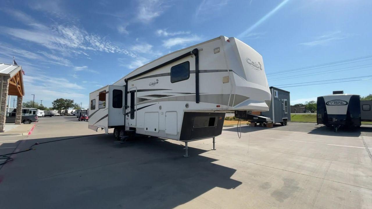 2011 WHITE CARRIAGE CABO 361 - (16F62G4R9B1) , Length: 36.92 ft. | Dry Weight: 11,275 lbs. | Slides: 3 transmission, located at 4319 N Main Street, Cleburne, TX, 76033, (817) 221-0660, 32.435829, -97.384178 - This 2011 Carriage Cabo 361 fifth wheel measures just under 37' in length. It is a dual axle setup with a dry weight of 11,275 lbs and a carrying capacity of 3,724 lbs. With three slides, this fifth wheel is spacious! The Columbus's exterior is made from fiberglass, finished in white with tan graphi - Photo #4