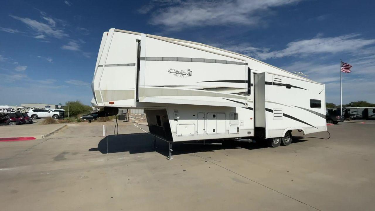 2011 WHITE CARRIAGE CABO 361 - (16F62G4R9B1) , Length: 36.92 ft. | Dry Weight: 11,275 lbs. | Slides: 3 transmission, located at 4319 N Main Street, Cleburne, TX, 76033, (817) 221-0660, 32.435829, -97.384178 - This 2011 Carriage Cabo 361 fifth wheel measures just under 37' in length. It is a dual axle setup with a dry weight of 11,275 lbs and a carrying capacity of 3,724 lbs. With three slides, this fifth wheel is spacious! The Columbus's exterior is made from fiberglass, finished in white with tan graphi - Photo #6