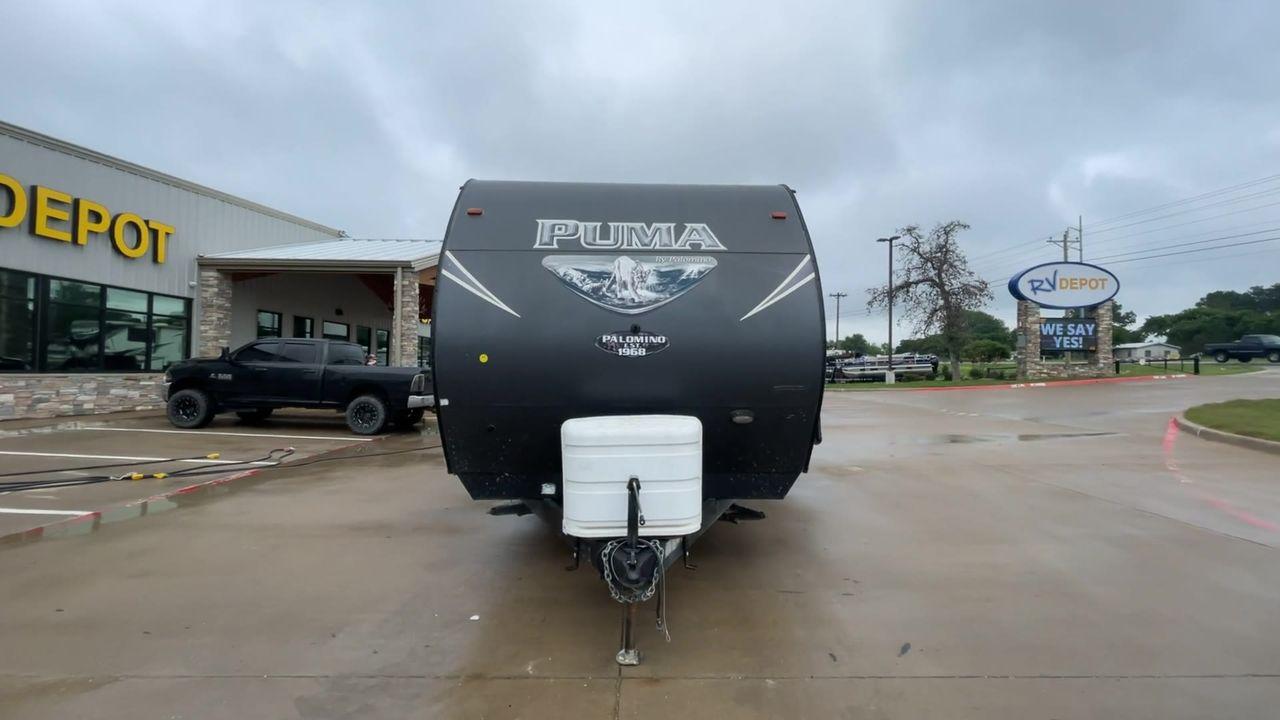 2017 PUMA XLITE28FQDB (4X4TPUD22HP) , Length: 33 ft | Dry Weight: 6,370 lbs | Gross Weight: 8,000 lbs | Slides: 1 transmission, located at 4319 N Main Street, Cleburne, TX, 76033, (817) 221-0660, 32.435829, -97.384178 - The 2017 Palomino Puma 28FQDB travel trailer is ideal for family excursions. With a length of 33 feet and a dry weight of 6,370 pounds, this RV is both large and lightweight, making it simple to tow and navigate on the road. With an outdoor kitchen and a large 20-foot motorized awning, you can enjoy - Photo #4