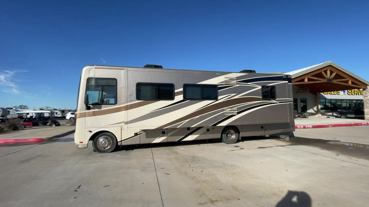 2014 BROWN HOLIDAY RAMBLER VACATIONER 33SFD - (1F66F5DY0D0) with an 6.8L V10 SOHC 30V engine, Length: 35 ft. | Slides: 2 transmission, located at 4319 N Main St, Cleburne, TX, 76033, (817) 678-5133, 32.385960, -97.391212 - The 2014 Holiday Rambler Vacationer 33SFD is a premium Class A motorhome that blends comfort and style for an unparalleled travel experience. This meticulously designed model is built on a Ford F53 chassis, powered by a robust Triton V10 engine to ensure a smooth and powerful ride. The Vacationer 33 - Photo #6
