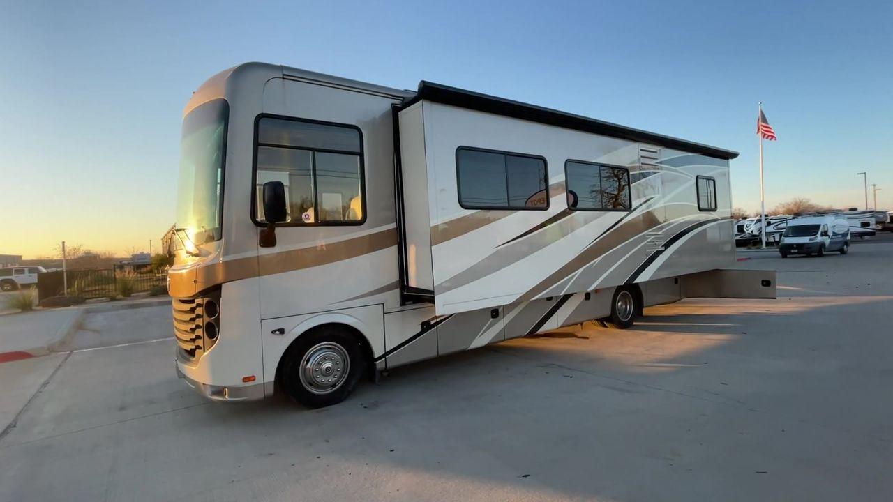 2014 BROWN HOLIDAY RAMBLER VACATIONER 33SFD - (1F66F5DY0D0) with an 6.8L V10 SOHC 30V engine, Length: 35 ft. | Slides: 2 transmission, located at 4319 N Main St, Cleburne, TX, 76033, (817) 678-5133, 32.385960, -97.391212 - The 2013 Holiday Rambler Vacationer 33SFD gives you the comfort and convenience of a residential home. The cockpit comes with a flat-screen TV above with lots of storage space. There is a comfy hide-a-bed sofa in the living area to have a comfortable view of the TV. Beside the couch is a free-standi - Photo #8