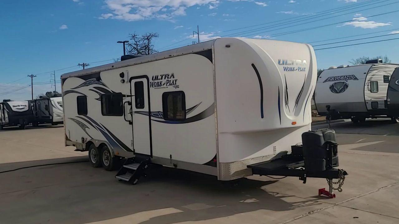 2014 WHITE FOREST RIVER WORK AND PLAY 25UDT (4X4TWPA21EB) , Length: 30.42 ft. | Dry Weight: 6,201 lbs. | Gross Weight: 9,987 lbs. | Slides: 0 transmission, located at 4319 N Main Street, Cleburne, TX, 76033, (817) 221-0660, 32.435829, -97.384178 - With the 2014 Forest River Work and Play 25UDT Toy Hauler, unleash the excitement of exploration. For people who want the comforts of home away from home combined with the excitement of outdoor activities, this tough and adaptable RV is ideal. The dimensions of this toy hauler are 30.42 ft in len - Photo #3