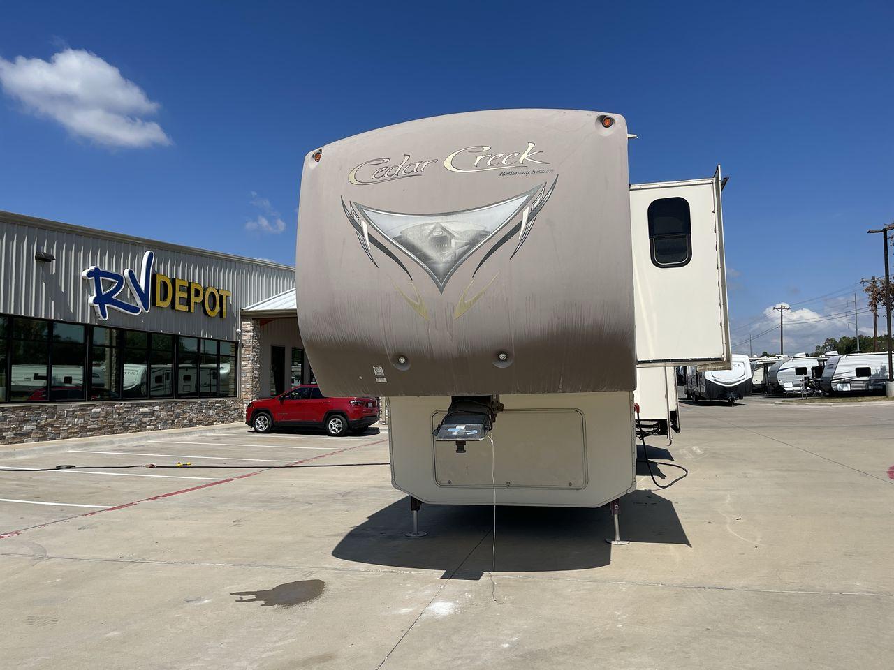 2016 BEIGE FOREST RIVER CEDAR C HATHAWAY 38RD (4X4FCRP28GS) , Length: 40 ft | Dry Weight: 13,840 lbs | Slides: 5 transmission, located at 4319 N Main St, Cleburne, TX, 76033, (817) 678-5133, 32.385960, -97.391212 - If you're in the market for a luxurious and spacious fifth wheel, look no further than this 2016 Forest River Cedar C Hathaway 38RD. Currently available for sale at RV Depot in Cleburne, TX, this stunning RV is sure to impress with its impressive features and local driving highlights. With a price - Photo #0
