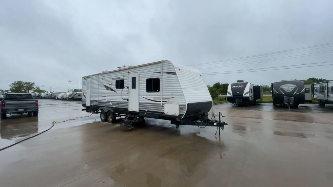 2013 TRAIL RUNNER 29FQBS (5SFEB3228DE) , Length: 32.33 ft. | Dry Weight: 6,724 lbs. | Slides: 1 transmission, located at 4319 N Main Street, Cleburne, TX, 76033, (817) 221-0660, 32.435829, -97.384178 - This 2013 Trail Runner 29FQBS is a single-slide travel trailer measuring approximately 32.33 feet long. It has a dry weight of 6,724 lbs. and a carrying capacity of 2,276 lbs. It also has a manageable hitch weight of 738 lbs. As you enter the camper, you will find the kitchen section immediately to - Photo #3