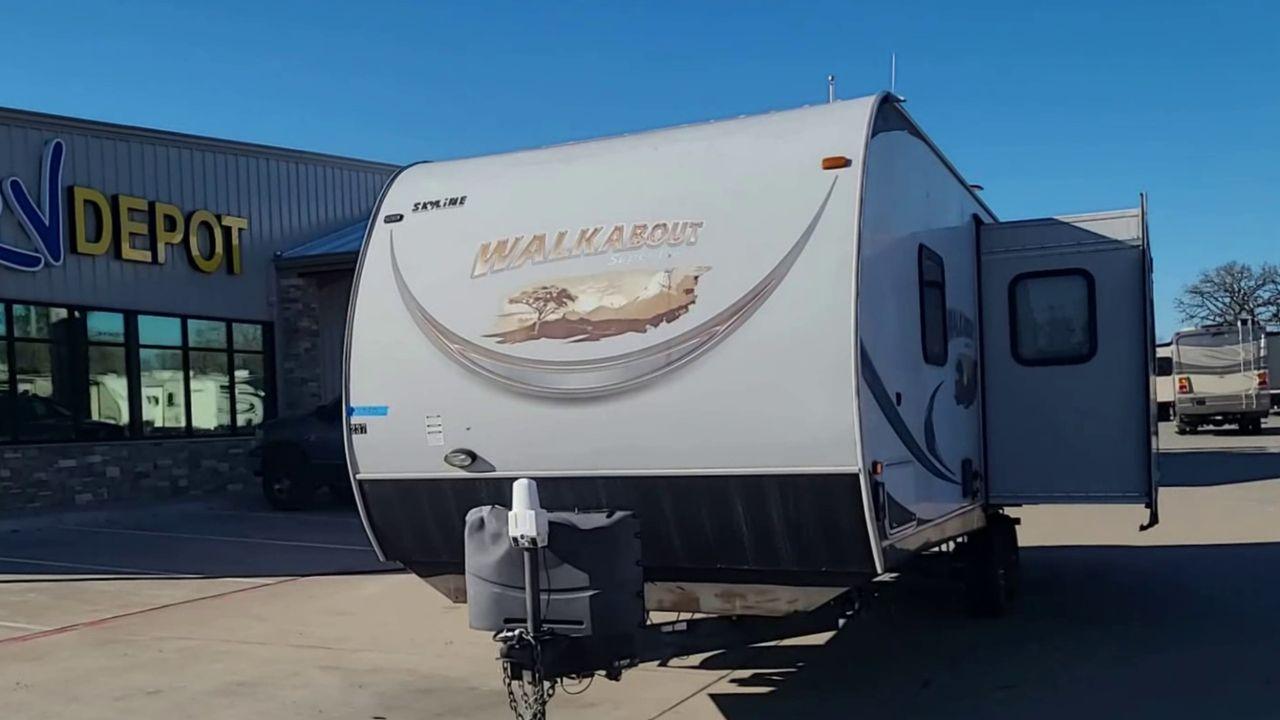 2014 TAN SKYLINE WALKABOUT 26SS - (1SE200M22EC) , Length: 29.25 ft. | Dry Weight: 5,350 lbs. | Slides: 1 transmission, located at 4319 N Main St, Cleburne, TX, 76033, (817) 678-5133, 32.385960, -97.391212 - In this elegantly constructed 2017 Forest River Sandpiper 3250IK Travel Trailer, enjoy comfortable and cozy camping. For those looking for a home away from home during their outdoor activities, this RV offers the ideal balance of comfort, design, and functionality. This trailer measures 29.5 ft in l - Photo #4