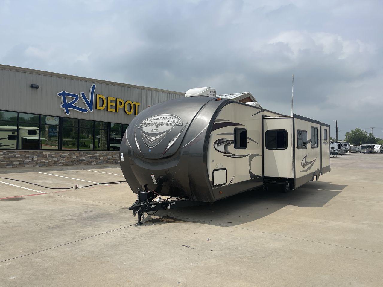 2017 TAN WILDWOOD HERITAGE GLEN 300BH (4X4TWBF29HU) , Length: 37.42 ft. | Dry Weight: 8,439 lbs. | Slides: 3 transmission, located at 4319 N Main Street, Cleburne, TX, 76033, (817) 221-0660, 32.435829, -97.384178 - The 2017 Wildwood Heritage Glen 300BH has roomy and comfortable rooms for your outdoor activities. This travel trailer offers ample space for the entire family, measuring 37.42 feet in length and weighing 8,439 pounds when dry. This trailer is designed with three slides, providing ample interior spa - Photo #0