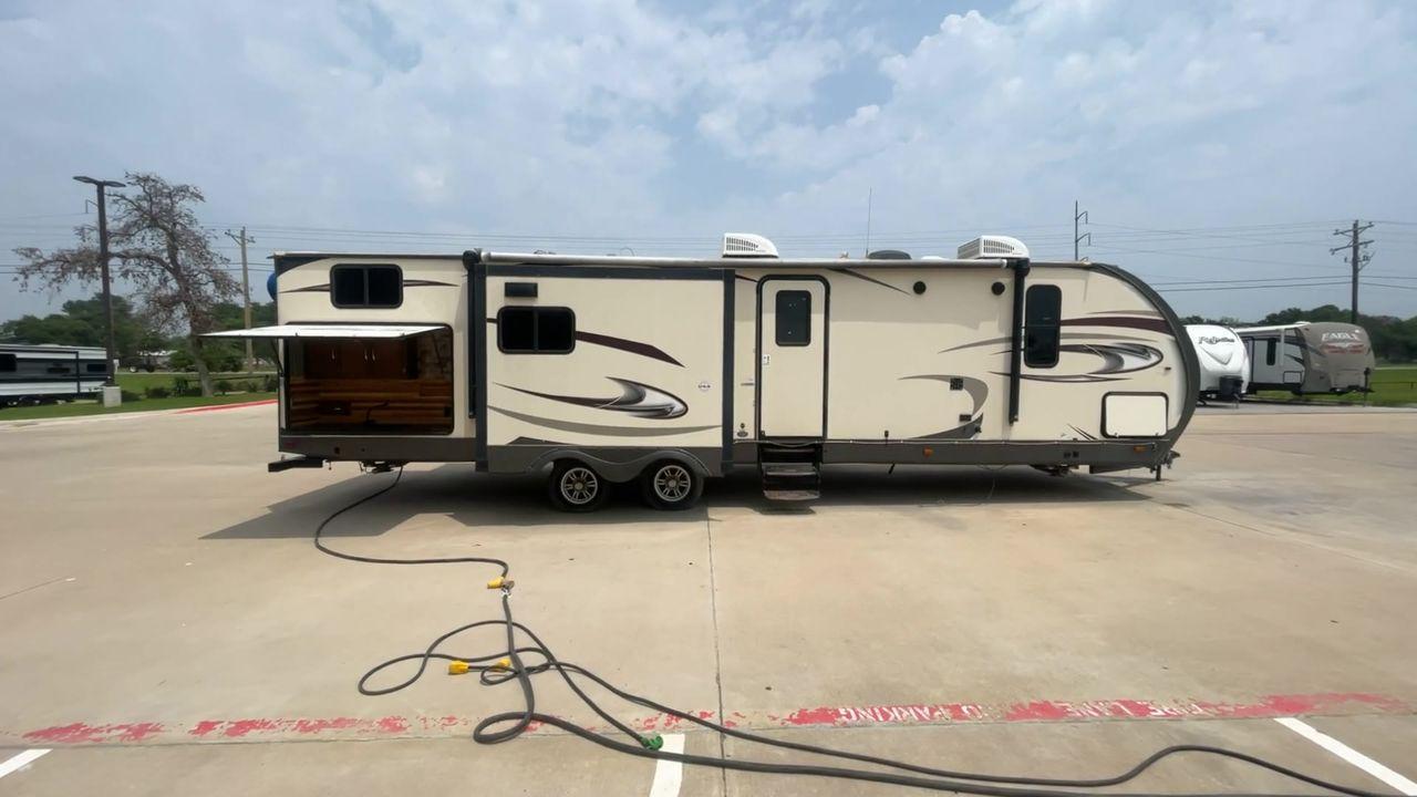 2017 TAN WILDWOOD HERITAGE GLEN 300BH (4X4TWBF29HU) , Length: 37.42 ft. | Dry Weight: 8,439 lbs. | Slides: 3 transmission, located at 4319 N Main Street, Cleburne, TX, 76033, (817) 221-0660, 32.435829, -97.384178 - The 2017 Wildwood Heritage Glen 300BH has roomy and comfortable rooms for your outdoor activities. This travel trailer offers ample space for the entire family, measuring 37.42 feet in length and weighing 8,439 pounds when dry. This trailer is designed with three slides, providing ample interior spa - Photo #2