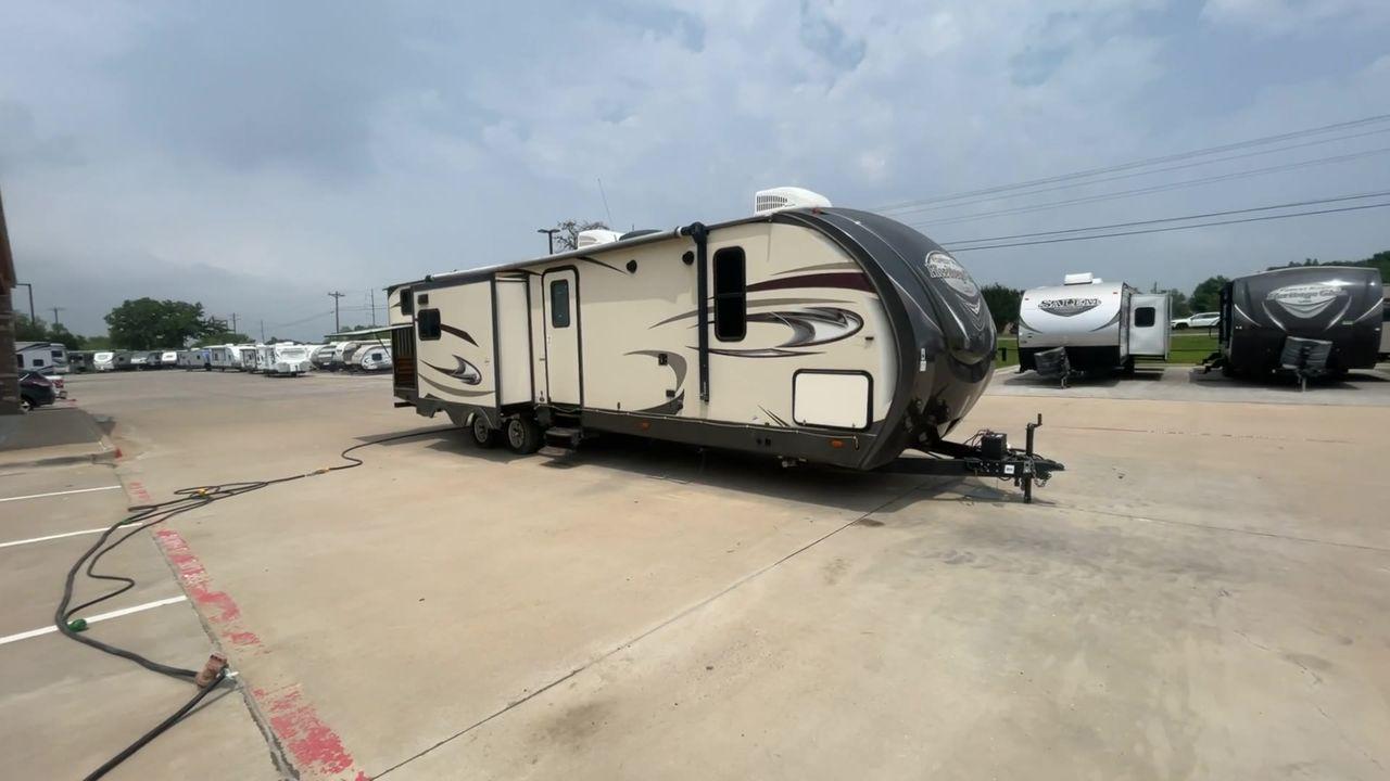 2017 TAN WILDWOOD HERITAGE GLEN 300BH (4X4TWBF29HU) , Length: 37.42 ft. | Dry Weight: 8,439 lbs. | Slides: 3 transmission, located at 4319 N Main Street, Cleburne, TX, 76033, (817) 221-0660, 32.435829, -97.384178 - The 2017 Wildwood Heritage Glen 300BH has roomy and comfortable rooms for your outdoor activities. This travel trailer offers ample space for the entire family, measuring 37.42 feet in length and weighing 8,439 pounds when dry. This trailer is designed with three slides, providing ample interior spa - Photo #3