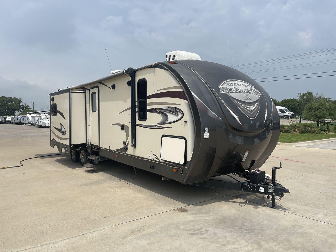 2017 TAN WILDWOOD HERITAGE GLEN 300BH (4X4TWBF29HU) , Length: 37.42 ft. | Dry Weight: 8,439 lbs. | Slides: 3 transmission, located at 4319 N Main Street, Cleburne, TX, 76033, (817) 221-0660, 32.435829, -97.384178 - The 2017 Wildwood Heritage Glen 300BH has roomy and comfortable rooms for your outdoor activities. This travel trailer offers ample space for the entire family, measuring 37.42 feet in length and weighing 8,439 pounds when dry. This trailer is designed with three slides, providing ample interior spa - Photo #23