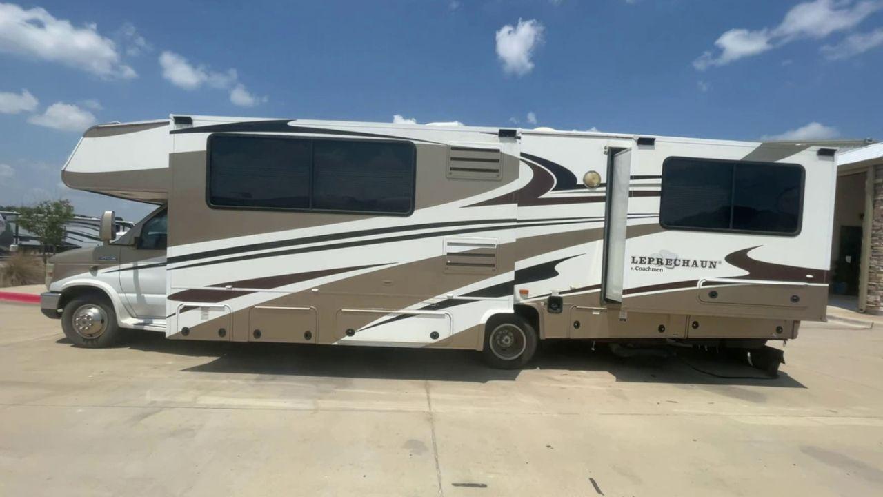 2008 TAN COACHMEN LEPRECHAUN 320DS E-450 (1FDXE45S08D) with an 6.8L V10 SOHC 20V engine, Length: 31.5 ft. | Dry Weight: 12,555 lbs. | Gross Weight: 14,500 lbs. | Slides: 2 transmission, located at 4319 N Main St, Cleburne, TX, 76033, (817) 678-5133, 32.385960, -97.391212 - Here are some unique features and characteristics of the 2008 Coachmen Leprechaun 320DS that will make you want to buy this motorhome. (1) The 2008 Coachmen Leprechaun 320DS has two slide-outs, which expand the living space to create more room for relaxation and entertainment. With these additional - Photo #1