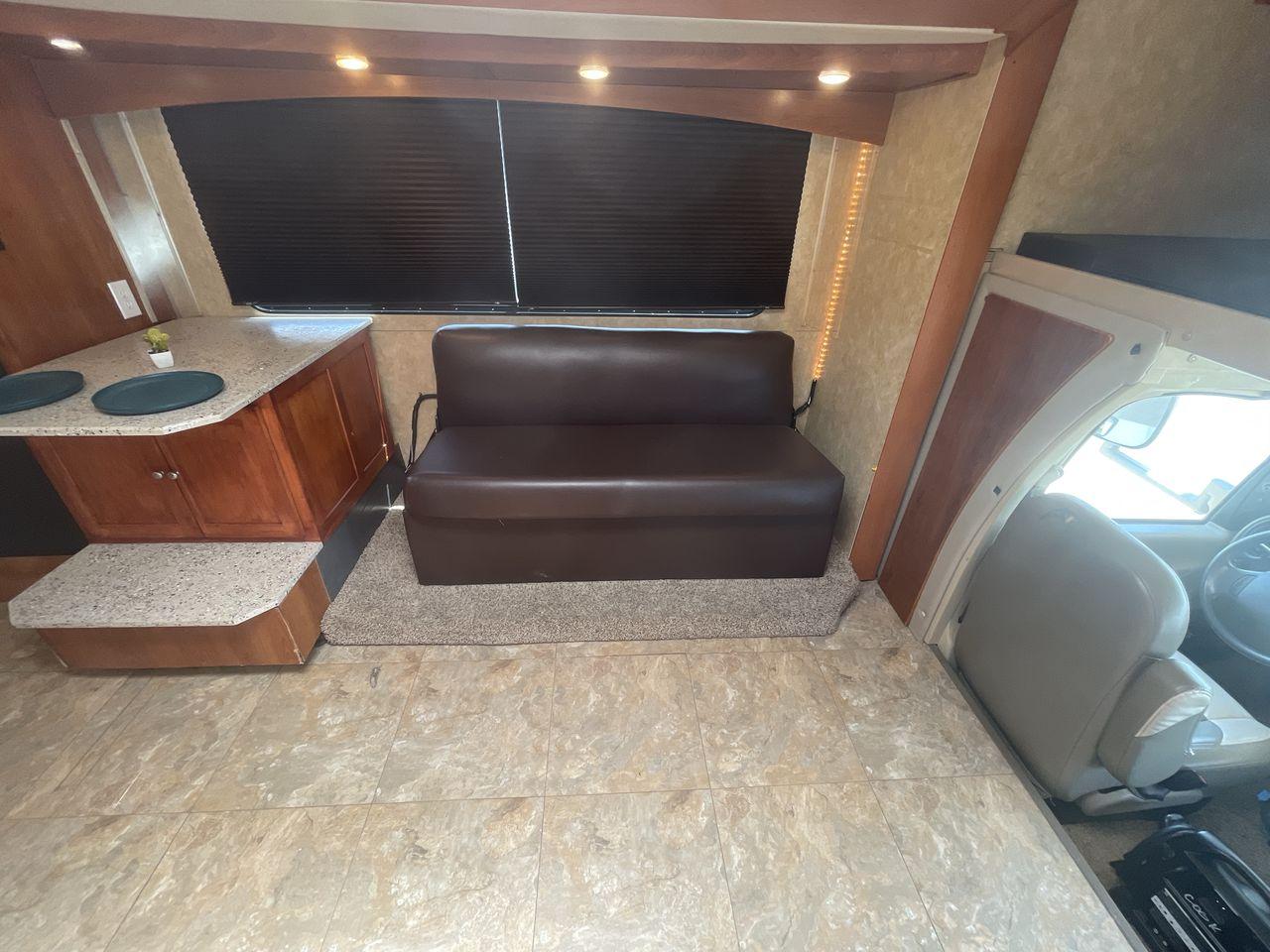 2008 TAN COACHMEN LEPRECHAUN 320DS E-450 (1FDXE45S08D) with an 6.8L V10 SOHC 20V engine, Length: 31.5 ft. | Dry Weight: 12,555 lbs. | Gross Weight: 14,500 lbs. | Slides: 2 transmission, located at 4319 N Main Street, Cleburne, TX, 76033, (817) 221-0660, 32.435829, -97.384178 - Photo #12