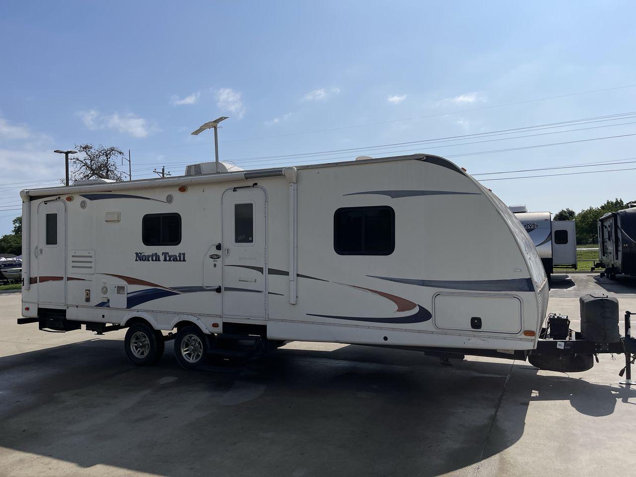 2011 WHITE HEARTLAND NORTH TRAIL 26B (5SFNB3225BE) , Length: 32.5 ft. | Dry Weight: 7,104 lbs. | Gross Weight: 8,600 lbs. | Slides: 2 transmission, located at 4319 N Main St, Cleburne, TX, 76033, (817) 678-5133, 32.385960, -97.391212 - Enjoy a spontaneous weekend getaway in this 2011 Heartland North Trail 26BRSS Travel Trailer! It is a dual-axle steel wheel setup measuring 32.5 ft. in length and 10.83 ft. in height. It has a dry weight of 7,104 lbs. and a GVWR of 8,600 lbs. It is equipped with automatic heating and cooling rated a - Photo #21