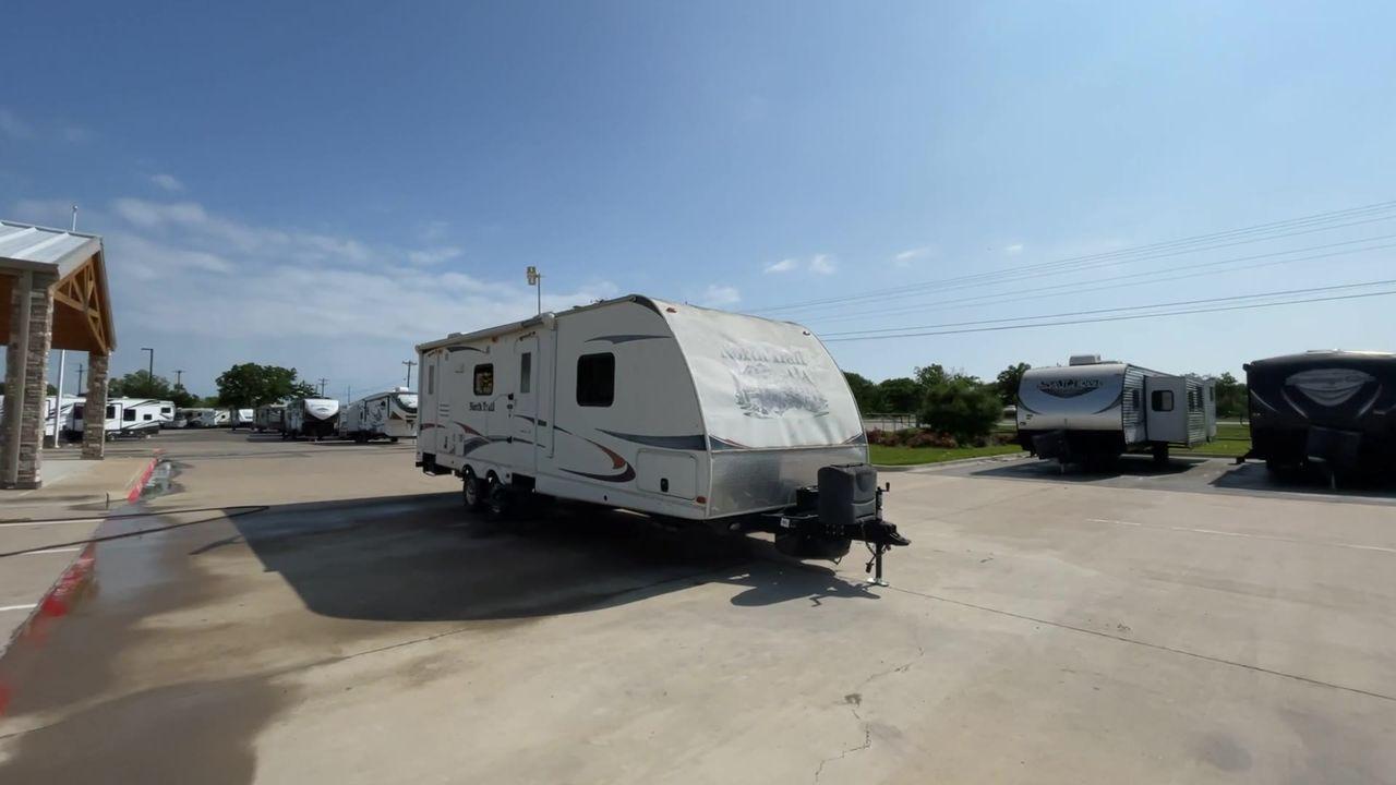 2011 WHITE HEARTLAND NORTH TRAIL 26B (5SFNB3225BE) , Length: 32.5 ft. | Dry Weight: 7,104 lbs. | Gross Weight: 8,600 lbs. | Slides: 2 transmission, located at 4319 N Main Street, Cleburne, TX, 76033, (817) 221-0660, 32.435829, -97.384178 - Enjoy a spontaneous weekend getaway in this 2011 Heartland North Trail 26BRSS Travel Trailer! It is a dual-axle steel wheel setup measuring 32.5 ft. in length and 10.83 ft. in height. It has a dry weight of 7,104 lbs. and a GVWR of 8,600 lbs. It is equipped with automatic heating and cooling rated a - Photo #3
