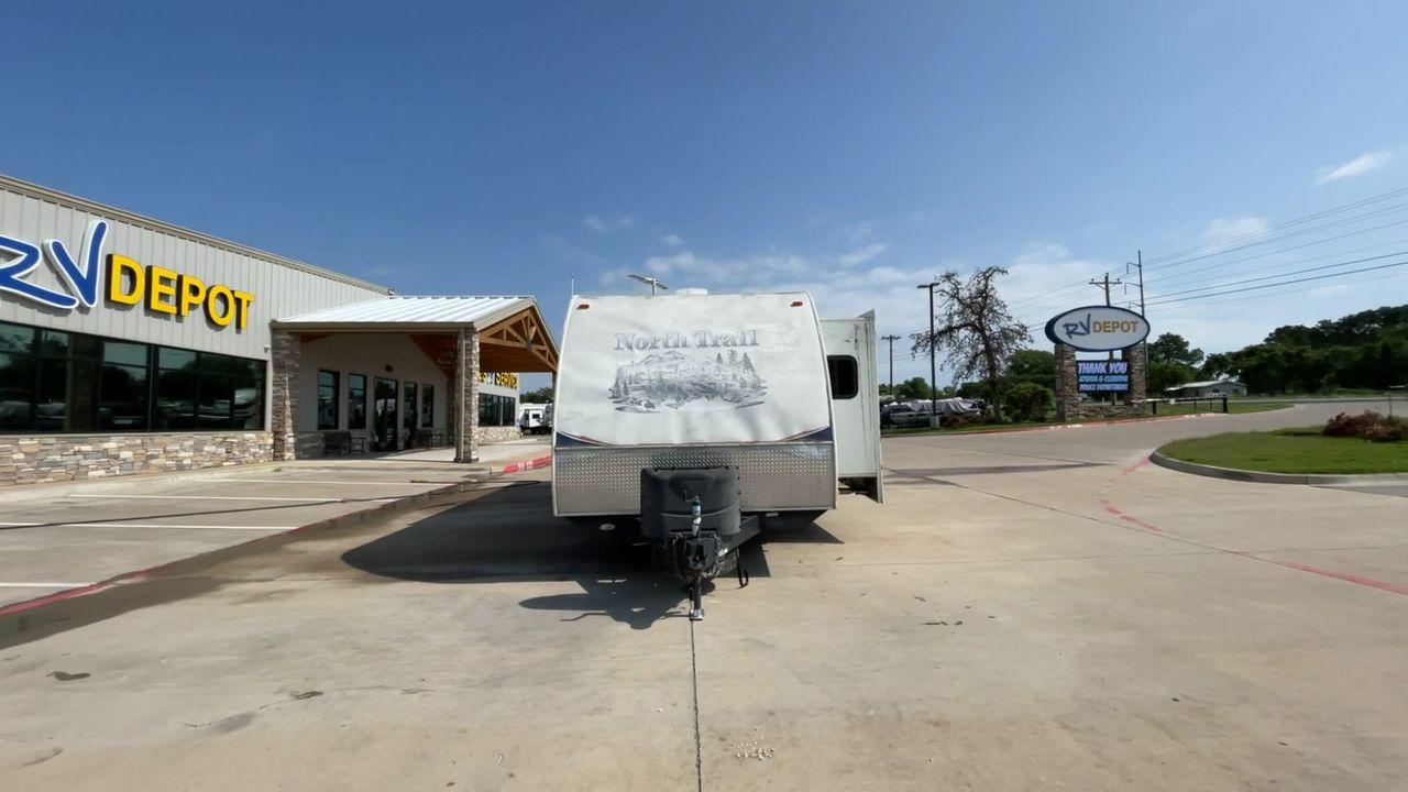 2011 WHITE HEARTLAND NORTH TRAIL 26B (5SFNB3225BE) , Length: 32.5 ft. | Dry Weight: 7,104 lbs. | Gross Weight: 8,600 lbs. | Slides: 2 transmission, located at 4319 N Main St, Cleburne, TX, 76033, (817) 678-5133, 32.385960, -97.391212 - Enjoy a spontaneous weekend getaway in this 2011 Heartland North Trail 26BRSS Travel Trailer! It is a dual-axle steel wheel setup measuring 32.5 ft. in length and 10.83 ft. in height. It has a dry weight of 7,104 lbs. and a GVWR of 8,600 lbs. It is equipped with automatic heating and cooling rated a - Photo #4