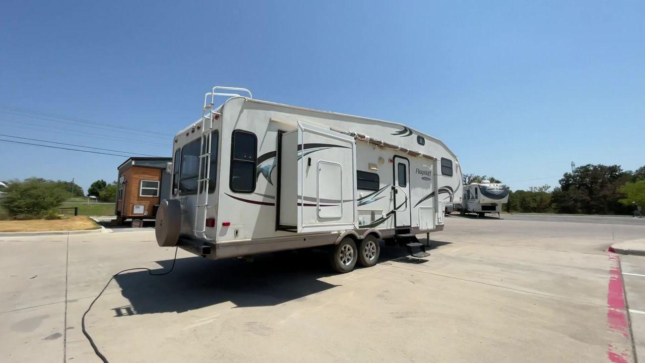 2010 WHITE FLAGSTAFF 8528CKSS - (4X4FFLD20A1) , Length: 30 ft. | Dry Weight: 6,877 lbs. | Slides: 2 transmission, located at 4319 N Main Street, Cleburne, TX, 76033, (817) 221-0660, 32.435829, -97.384178 - The 2010 Flagstaff 8528CKSS CT is a well-crafted and compact travel trailer designed for comfort and convenience on the road. With a length of 30 feet 11 inches, a width of 8 feet, and a height of 12 feet 7 inches, this trailer offers a balance of space and maneuverability. Its thoughtful constructi - Photo #1