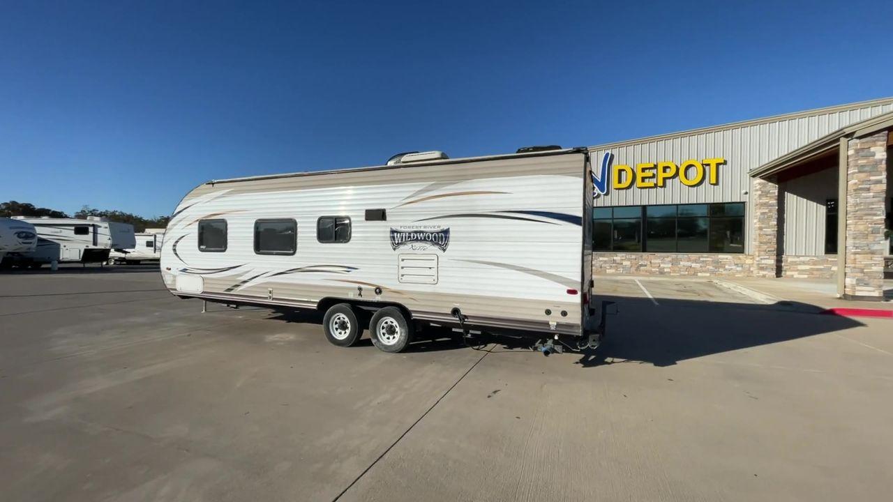 2016 WHITE WILDWOOD X-LITE 261BHXL - (4X4TWDB2XG7) , Length: 29.08 ft. | Dry Weight: 4,314 lbs. | Slides: 0 transmission, located at 4319 N Main Street, Cleburne, TX, 76033, (817) 221-0660, 32.435829, -97.384178 - Experience the perfect blend of comfort and convenience with the 2016 Wildwood X-Lite 261BHXL for your outdoor adventures. This travel trailer offers a great balance between spaciousness and maneuverability, making it an ideal choice for those seeking a comfortable and easy-to-handle option. Even wi - Photo #7