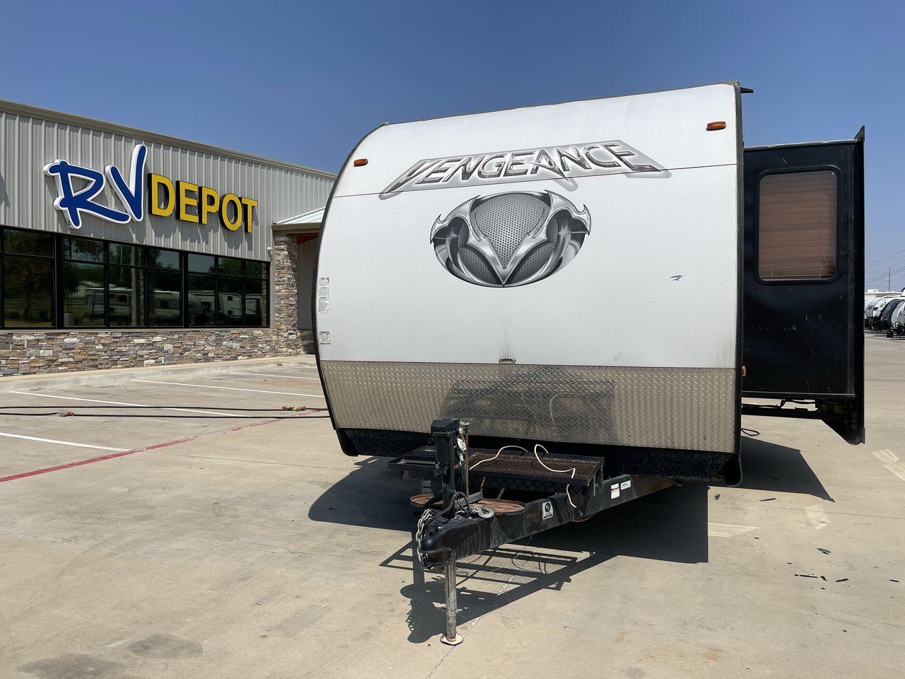 2015 WHITE VENGEANCE SU 29V (4X4TVGE24FY) , Length: 34.5 ft. | Dry Weight: 7,618 lbs. | Gross Weight: 9,985 lbs. | Slides: 1 transmission, located at 4319 N Main Street, Cleburne, TX, 76033, (817) 221-0660, 32.435829, -97.384178 - The 2015 Vengeance SU 29V is a versatile and spacious toy hauler, ideal for outdoor enthusiasts who crave adventure. With a length of 34.5 feet and a dry weight of 7,618 pounds, this travel trailer provides generous storage space while ensuring your comfort is not compromised. With a single slide, t - Photo #0