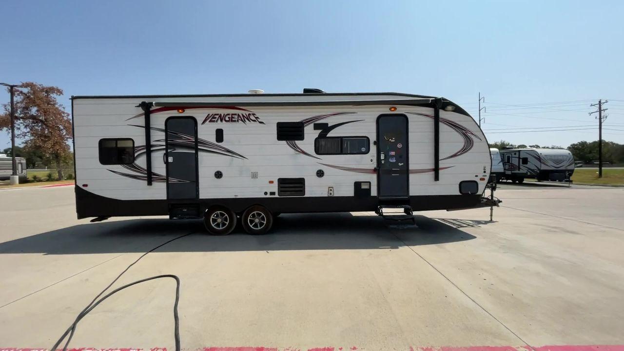 2015 WHITE VENGEANCE SU 29V (4X4TVGE24FY) , Length: 34.5 ft. | Dry Weight: 7,618 lbs. | Gross Weight: 9,985 lbs. | Slides: 1 transmission, located at 4319 N Main Street, Cleburne, TX, 76033, (817) 221-0660, 32.435829, -97.384178 - The 2015 Vengeance SU 29V is a versatile and spacious toy hauler, ideal for outdoor enthusiasts who crave adventure. With a length of 34.5 feet and a dry weight of 7,618 pounds, this travel trailer provides generous storage space while ensuring your comfort is not compromised. With a single slide, t - Photo #2