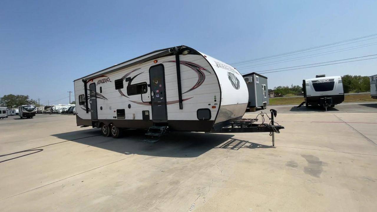 2015 WHITE VENGEANCE SU 29V (4X4TVGE24FY) , Length: 34.5 ft. | Dry Weight: 7,618 lbs. | Gross Weight: 9,985 lbs. | Slides: 1 transmission, located at 4319 N Main Street, Cleburne, TX, 76033, (817) 221-0660, 32.435829, -97.384178 - The 2015 Vengeance SU 29V is a versatile and spacious toy hauler, ideal for outdoor enthusiasts who crave adventure. With a length of 34.5 feet and a dry weight of 7,618 pounds, this travel trailer provides generous storage space while ensuring your comfort is not compromised. With a single slide, t - Photo #3