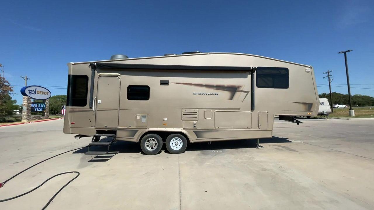 2008 BROWN DOMANI DF300 - (16F62M3PX81) , Length: 31.67 ft. | Dry Weight: 9,240 lbs. | Slides: 2 transmission, located at 4319 N Main Street, Cleburne, TX, 76033, (817) 221-0660, 32.435829, -97.384178 - This is a versatile and compact RV designed for adventure seekers and travel enthusiasts. This sleek and aerodynamic unit boasts a length of 30 feet, providing the perfect balance between maneuverability and spaciousness. Equipped with a powerful 6.8L Triton V10 engine, this motorhome ensures a smoo - Photo #2