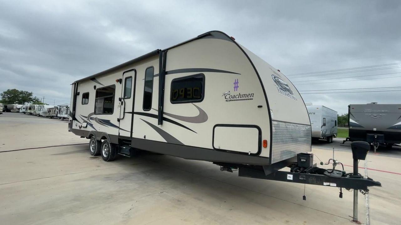2015 TAN FREEDOM EXPRESS 305RKDS (5ZT2FEWB1FA) , Length: 34.5 ft. | Dry Weight: 6,199 lbs | Gross Weight: 9,500 lbs. | Slides: 2 transmission, located at 4319 N Main St, Cleburne, TX, 76033, (817) 678-5133, 32.385960, -97.391212 - The 2015 Freedom Express 305RKDS is a travel trailer designed to deliver an exceptional camping experience, combining freedom and comfort in every detail. It boasts a rear kitchen layout, providing a unique and functional living space. The rear kitchen is equipped with high-end appliances, ample cou - Photo #3