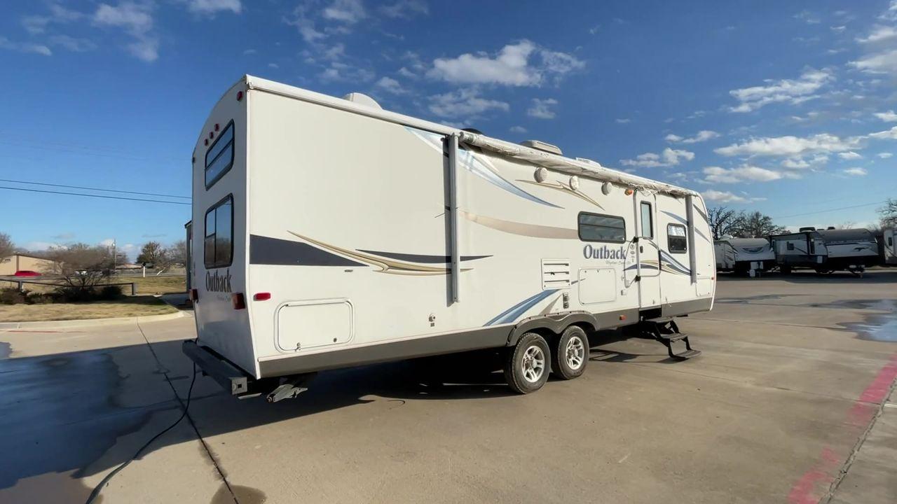 2012 WHITE KEYSTONE OUTBACK 292BH (4YDT29225CB) , Length: 32.75 | Dry Weight: 6,559 lbs. | Gross Weight: 8,200 lbs. | Slides: 1 transmission, located at 4319 N Main St, Cleburne, TX, 76033, (817) 678-5133, 32.385960, -97.391212 - The 2012 Keystone Outback 292BH is a versatile and well-equipped travel trailer perfect for enjoyable family adventures. This model offers a great balance between spaciousness and towability, with a length of 32.75 feet and a dry weight of 6,559 pounds. With a single slide, the Outback 292BH provide - Photo #1
