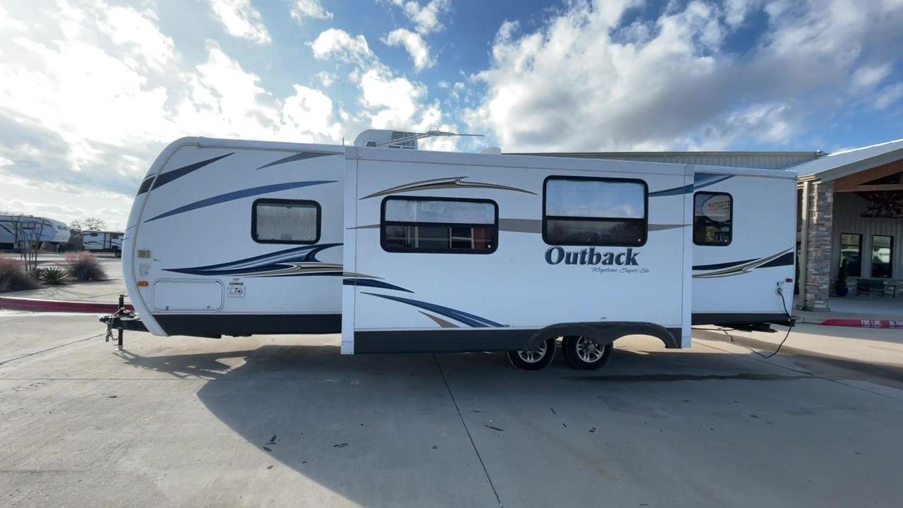 2012 WHITE KEYSTONE OUTBACK 292BH (4YDT29225CB) , Length: 32.75 | Dry Weight: 6,559 lbs. | Gross Weight: 8,200 lbs. | Slides: 1 transmission, located at 4319 N Main St, Cleburne, TX, 76033, (817) 678-5133, 32.385960, -97.391212 - The 2012 Keystone Outback 292BH is a versatile and well-equipped travel trailer perfect for enjoyable family adventures. This model offers a great balance between spaciousness and towability, with a length of 32.75 feet and a dry weight of 6,559 pounds. With a single slide, the Outback 292BH provide - Photo #6