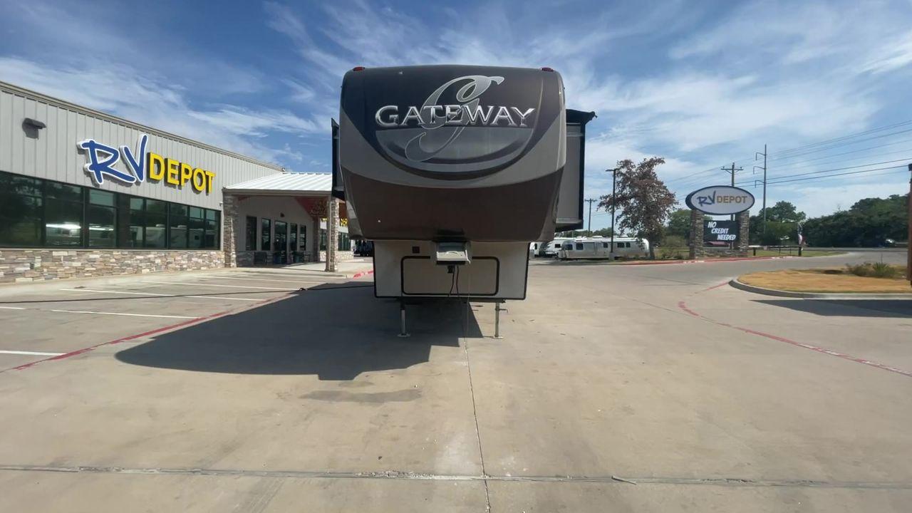 2015 BROWN HEARTLAND GATEWAY 3900SE (5SFSG4122FE) , Slides: 4 transmission, located at 4319 N Main St, Cleburne, TX, 76033, (817) 678-5133, 32.385960, -97.391212 - The 2015 Heartland Gateway 3900SE is a luxurious and spacious fifth-wheel RV designed for comfort and extended camping adventures. Measuring 41 feet in length and 8 feet in width, this RV offers ample space and a striking exterior. Constructed with a strong and lightweight aluminum frame, and fiberg - Photo #4