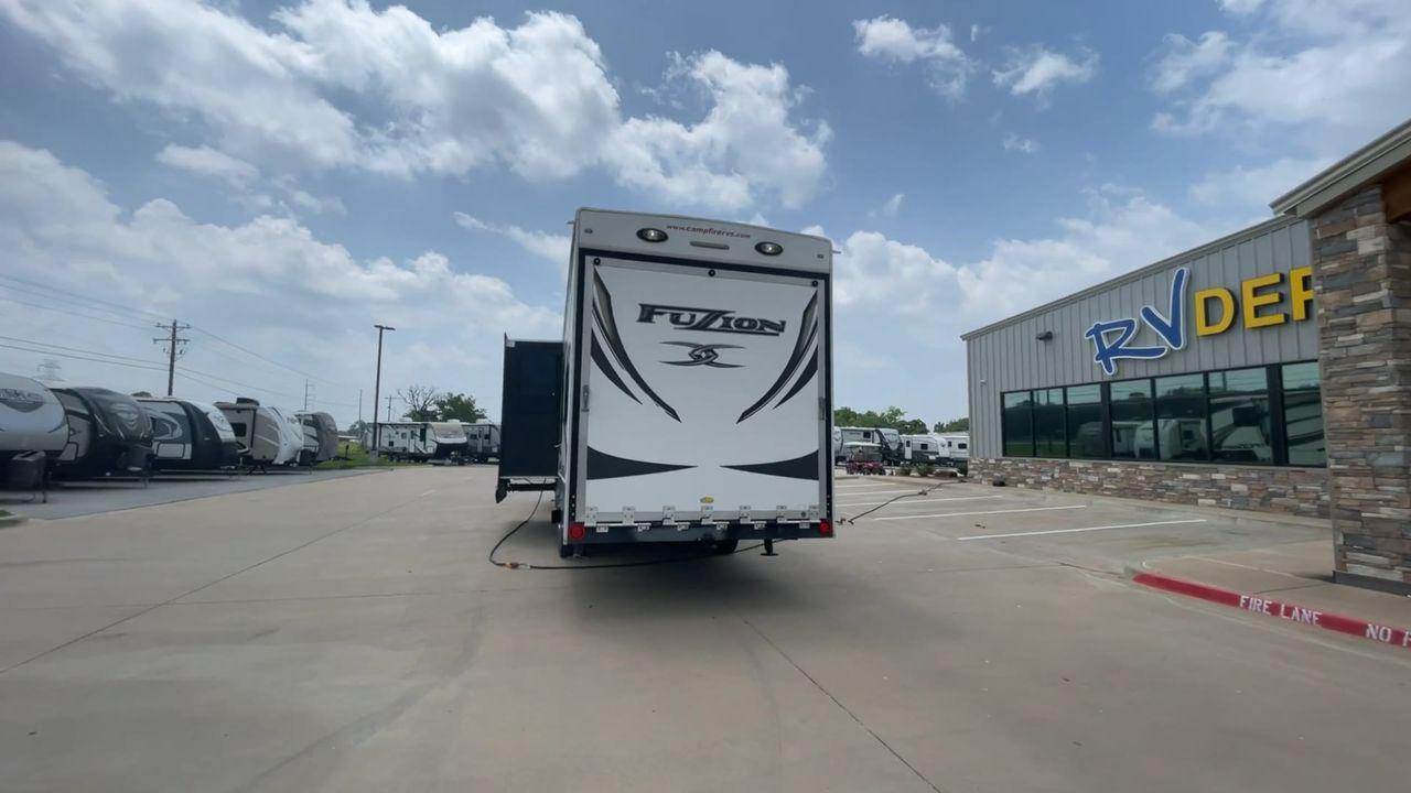 2014 WHITE KEYSTONE FUZION M-399 (4YDF39939EF) , Length: 41 ft. | Dry Weight: 14,100 lbs. | Gross Weight: 18,000 lbs. | Slides: 3 transmission, located at 4319 N Main St, Cleburne, TX, 76033, (817) 678-5133, 32.385960, -97.391212 - The 2014 Keystone Fuzion M-399 offers exceptional value for its price. With its white exterior color, this RV stands out on the road and is sure to turn heads wherever you go. Measuring 41 ft. in length, this toy hauler provides ample space for you and your loved ones to relax and enjoy your travels - Photo #8