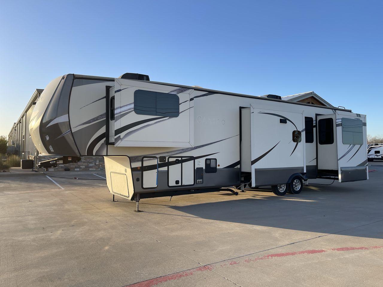 2017 TAN CAMEO 3701RD (4V0FC3727HR) , Length: 42.08 ft. | Dry Weight: 13,848 lbs. | Gross Weight: 16,678 lbs. | Slides: 5 transmission, located at 4319 N Main St, Cleburne, TX, 76033, (817) 678-5133, 32.385960, -97.391212 - At 42.08 feet in length and boasting five slideouts, the Cameo 3701RD is a masterclass in RV luxury that beckons you to embark on a journey where every mile is marked by comfort, style, and unparalleled sophistication. Crafted by CrossRoads RV, the Cameo series is celebrated for its unparalleled cra - Photo #24