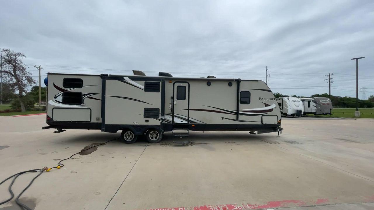 2015 WHITE KEYSTONE PASSPORT 3320 BH - (4YDT33229FT) , Length: 36.83 ft. | Dry Weight: 6,590 lbs. | Gross Weight: 8,000 lbs. | Slides: 3 transmission, located at 4319 N Main Street, Cleburne, TX, 76033, (817) 221-0660, 32.435829, -97.384178 - With the 2015 Keystone Passport 3320BH travel trailer, you can easily bring friends along for a fun camping adventure. This unit measures 36.83 ft. in length and 10.92 ft. in height. It has a dry weight of 6,590 lbs. with a payload capacity of 1,410 lbs. The GVWR is about 8,000 lbs, and the hitch we - Photo #26