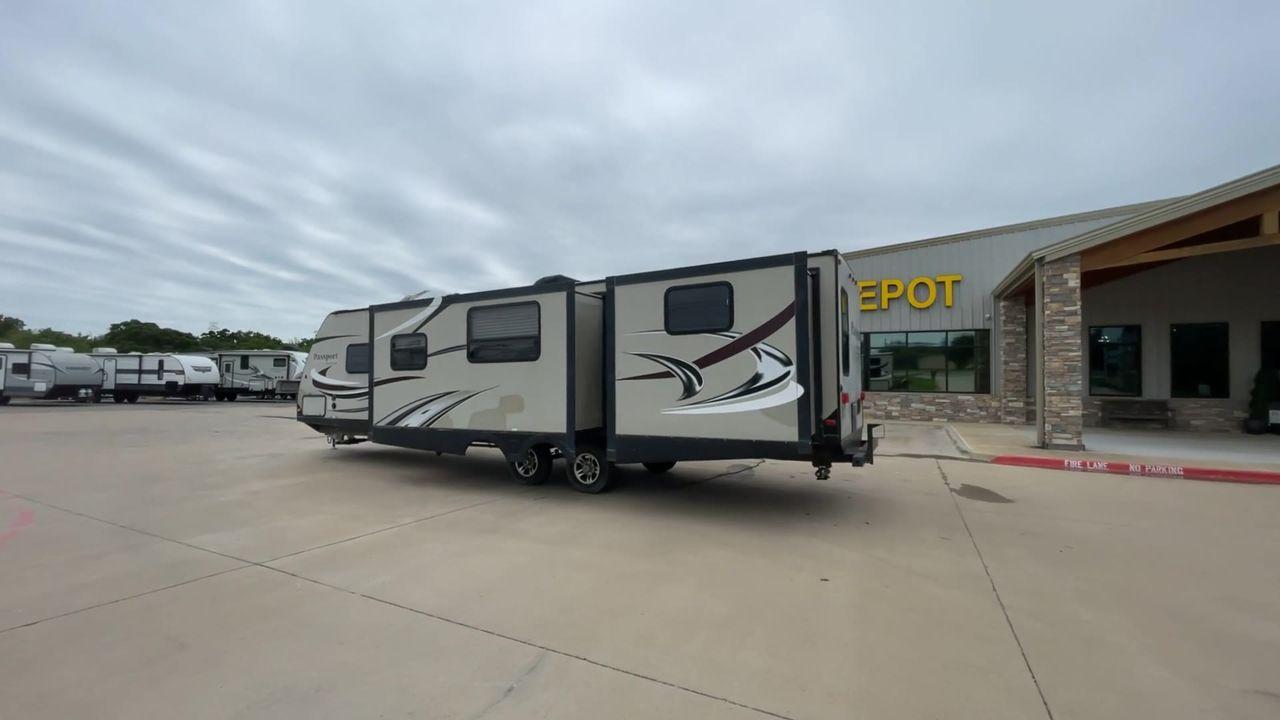 2015 WHITE KEYSTONE PASSPORT 3320 BH - (4YDT33229FT) , Length: 36.83 ft. | Dry Weight: 6,590 lbs. | Gross Weight: 8,000 lbs. | Slides: 3 transmission, located at 4319 N Main Street, Cleburne, TX, 76033, (817) 221-0660, 32.435829, -97.384178 - With the 2015 Keystone Passport 3320BH travel trailer, you can easily bring friends along for a fun camping adventure. This unit measures 36.83 ft. in length and 10.92 ft. in height. It has a dry weight of 6,590 lbs. with a payload capacity of 1,410 lbs. The GVWR is about 8,000 lbs, and the hitch we - Photo #31