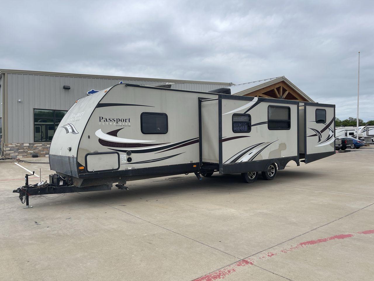 2015 WHITE KEYSTONE PASSPORT 3320 BH - (4YDT33229FT) , Length: 36.83 ft. | Dry Weight: 6,590 lbs. | Gross Weight: 8,000 lbs. | Slides: 3 transmission, located at 4319 N Main Street, Cleburne, TX, 76033, (817) 221-0660, 32.435829, -97.384178 - With the 2015 Keystone Passport 3320BH travel trailer, you can easily bring friends along for a fun camping adventure. This unit measures 36.83 ft. in length and 10.92 ft. in height. It has a dry weight of 6,590 lbs. with a payload capacity of 1,410 lbs. The GVWR is about 8,000 lbs, and the hitch we - Photo #48