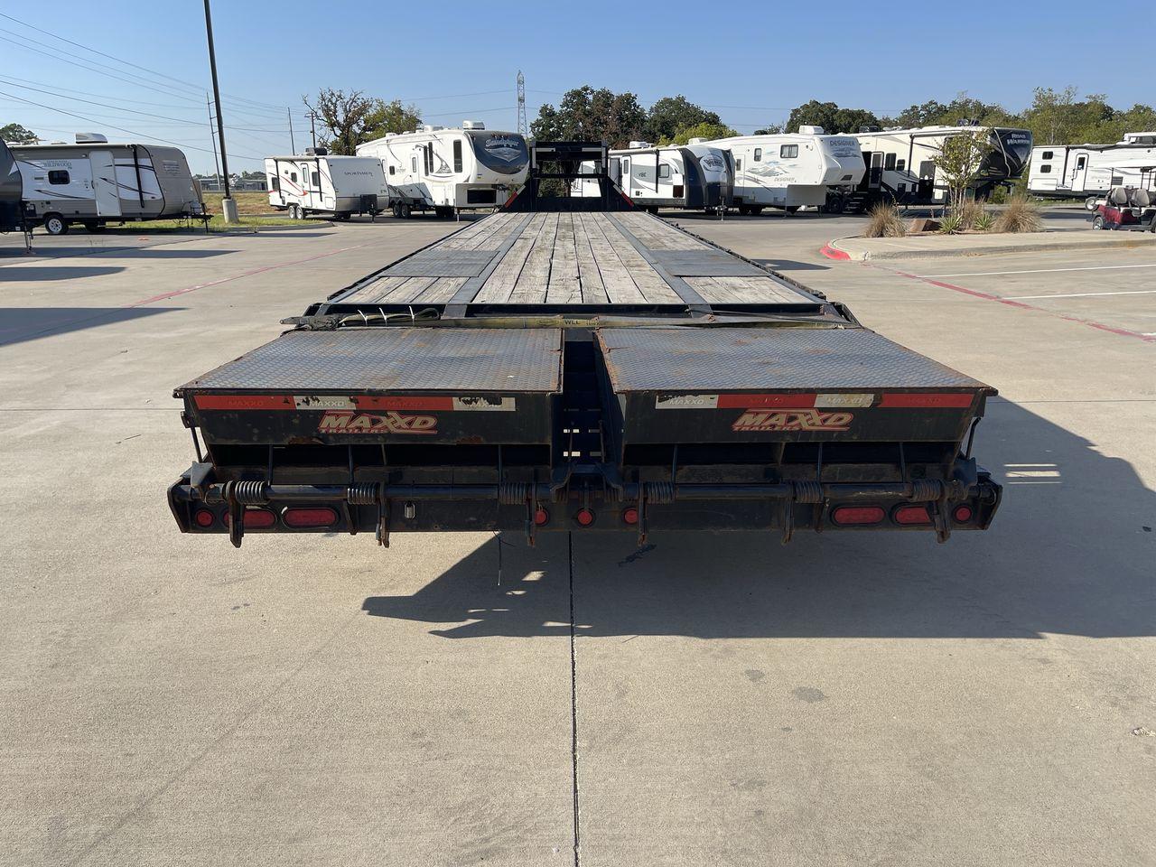2018 BLACK MAXEY TRAILERS LDX 40 - (5R8GF4027JM) , located at 4319 N Main Street, Cleburne, TX, 76033, (817) 221-0660, 32.435829, -97.384178 - The 2018 Maxey Trailers LDX40 is a top-notch utility trailer that excels in handling a diverse array of hauling tasks. This trailer is perfect for effortlessly transporting equipment, materials, and cargo, thanks to its sturdy construction and adaptable design. The LDX40 is a spacious option, measur - Photo #13