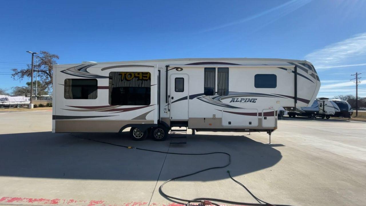 2014 WHITE ALPINE 3500RE - (4YDF35025EE) , Length: 39.17 ft. | Dry Weight: 12,379 lbs. | Gross Weight: 15,500 lbs. | Slides: 4 transmission, located at 4319 N Main Street, Cleburne, TX, 76033, (817) 221-0660, 32.435829, -97.384178 - The 2014 Alpine 3500RE fifth wheel combines style and utility. For individuals looking for a luxurious home on wheels, this RV's amenities are precisely crafted and comfort-oriented. The dimensions of this unit are 39.17 ft in length, 8 ft in width, and 12.67 ft in height. It has a dry weight of 12, - Photo #2