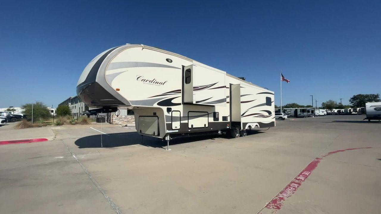 2016 BEIGE FOREST RIVER CARDINAL 3875FB - (4X4FCAR23GG) , Length: 40.5 ft. | Dry Weight: 14,034 lbs. | Gross Weight: 16,170 lbs. | Slides: 3 transmission, located at 4319 N Main St, Cleburne, TX, 76033, (817) 678-5133, 32.385960, -97.391212 - The elegant and well-equipped 2016 Forest River Cardinal 3875FB travel trailer will elevate your camping experience. Designed with care, this fifth wheel provides you with comfort, utility, and style for your road trips. This fifth wheel have dimensions of 40.5 ft in length, 8.33 ft in width, and - Photo #5