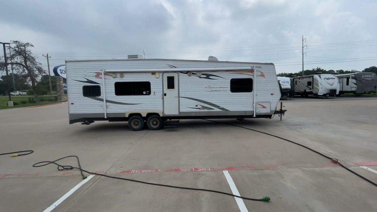 2008 WHITE ADRENALINE 23FS (1TC2B180683) , Length: 28.67 ft | Dry Weight: 6,474 lbs | Gross Weight: 9,500 lbs | Slides: 9 transmission, located at 4319 N Main Street, Cleburne, TX, 76033, (817) 221-0660, 32.435829, -97.384178 - The 2008 Adrenaline 23FS Toy Hauler is prepared for a journey! It is 28.67 feet long and weighs 6,474 pounds when dry. It's lightweight and portable, but large enough to hold all of your favorite toys and accessories. It can accommodate up to 9,500 pounds, so you'll have plenty of room for your next - Photo #2
