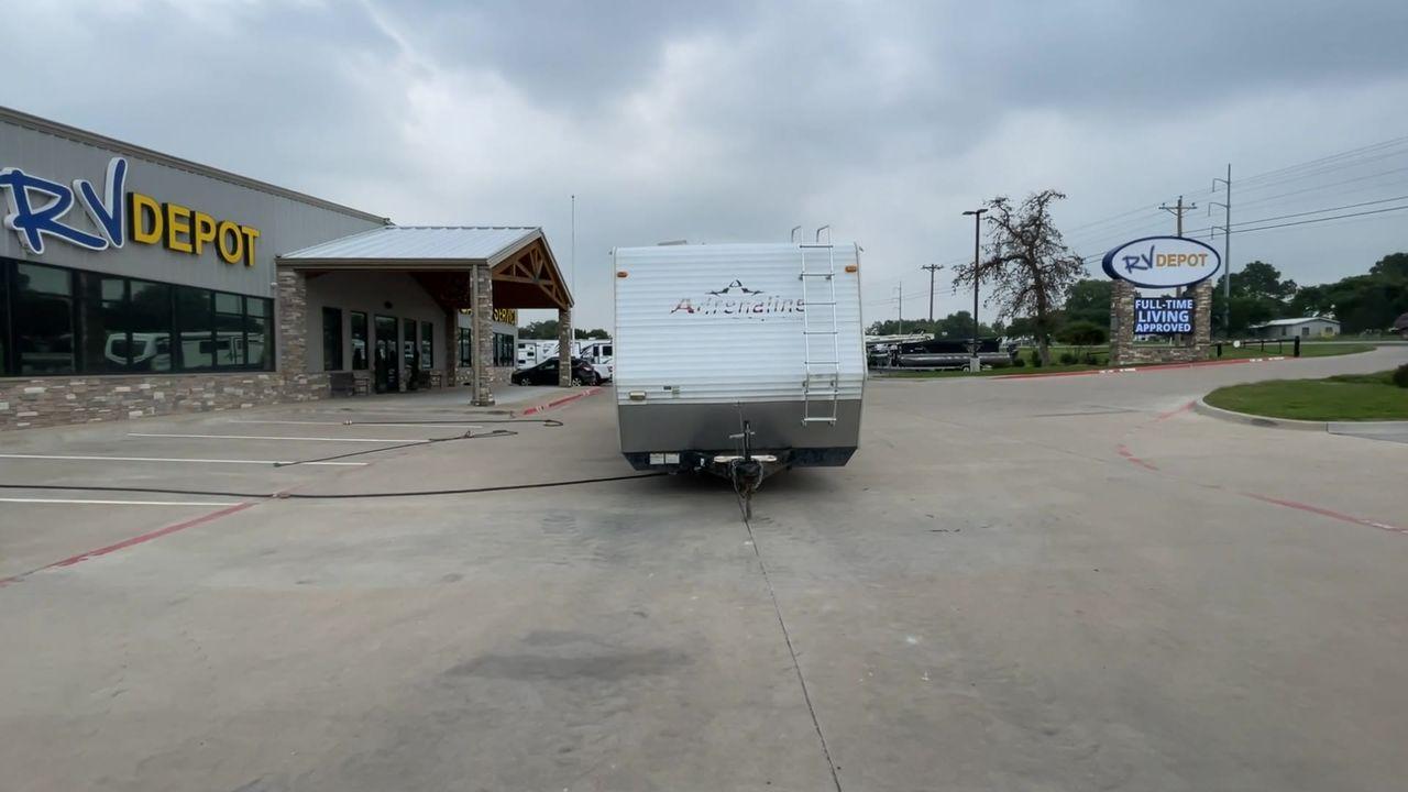 2008 WHITE ADRENALINE 23FS (1TC2B180683) , Length: 28.67 ft | Dry Weight: 6,474 lbs | Gross Weight: 9,500 lbs | Slides: 9 transmission, located at 4319 N Main Street, Cleburne, TX, 76033, (817) 221-0660, 32.435829, -97.384178 - The 2008 Adrenaline 23FS Toy Hauler is prepared for a journey! It is 28.67 feet long and weighs 6,474 pounds when dry. It's lightweight and portable, but large enough to hold all of your favorite toys and accessories. It can accommodate up to 9,500 pounds, so you'll have plenty of room for your next - Photo #4