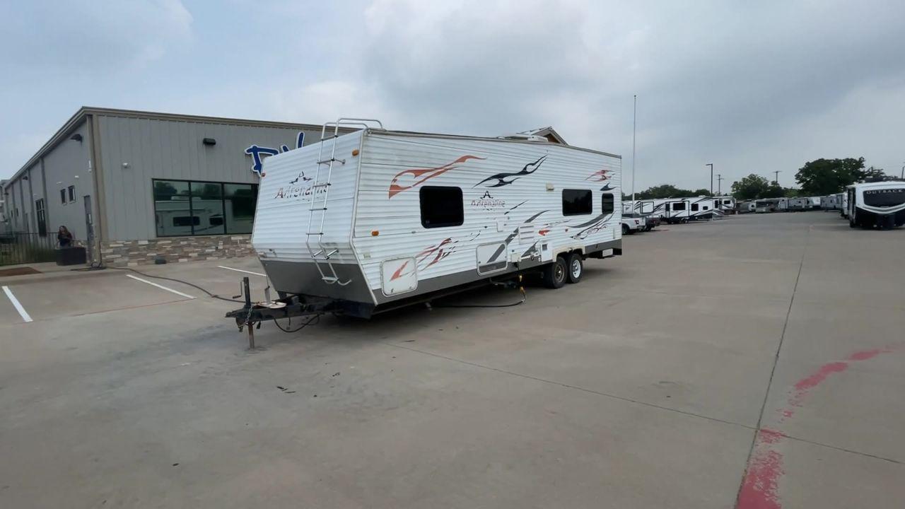 2008 WHITE ADRENALINE 23FS (1TC2B180683) , Length: 28.67 ft | Dry Weight: 6,474 lbs | Gross Weight: 9,500 lbs | Slides: 9 transmission, located at 4319 N Main Street, Cleburne, TX, 76033, (817) 221-0660, 32.435829, -97.384178 - The 2008 Adrenaline 23FS Toy Hauler is prepared for a journey! It is 28.67 feet long and weighs 6,474 pounds when dry. It's lightweight and portable, but large enough to hold all of your favorite toys and accessories. It can accommodate up to 9,500 pounds, so you'll have plenty of room for your next - Photo #5
