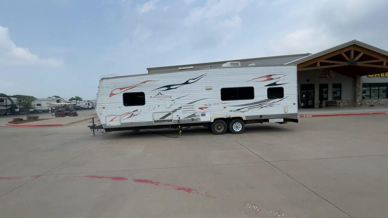 2008 WHITE ADRENALINE 23FS (1TC2B180683) , Length: 28.67 ft | Dry Weight: 6,474 lbs | Gross Weight: 9,500 lbs | Slides: 9 transmission, located at 4319 N Main Street, Cleburne, TX, 76033, (817) 221-0660, 32.435829, -97.384178 - The 2008 Adrenaline 23FS Toy Hauler is prepared for a journey! It is 28.67 feet long and weighs 6,474 pounds when dry. It's lightweight and portable, but large enough to hold all of your favorite toys and accessories. It can accommodate up to 9,500 pounds, so you'll have plenty of room for your next - Photo #6