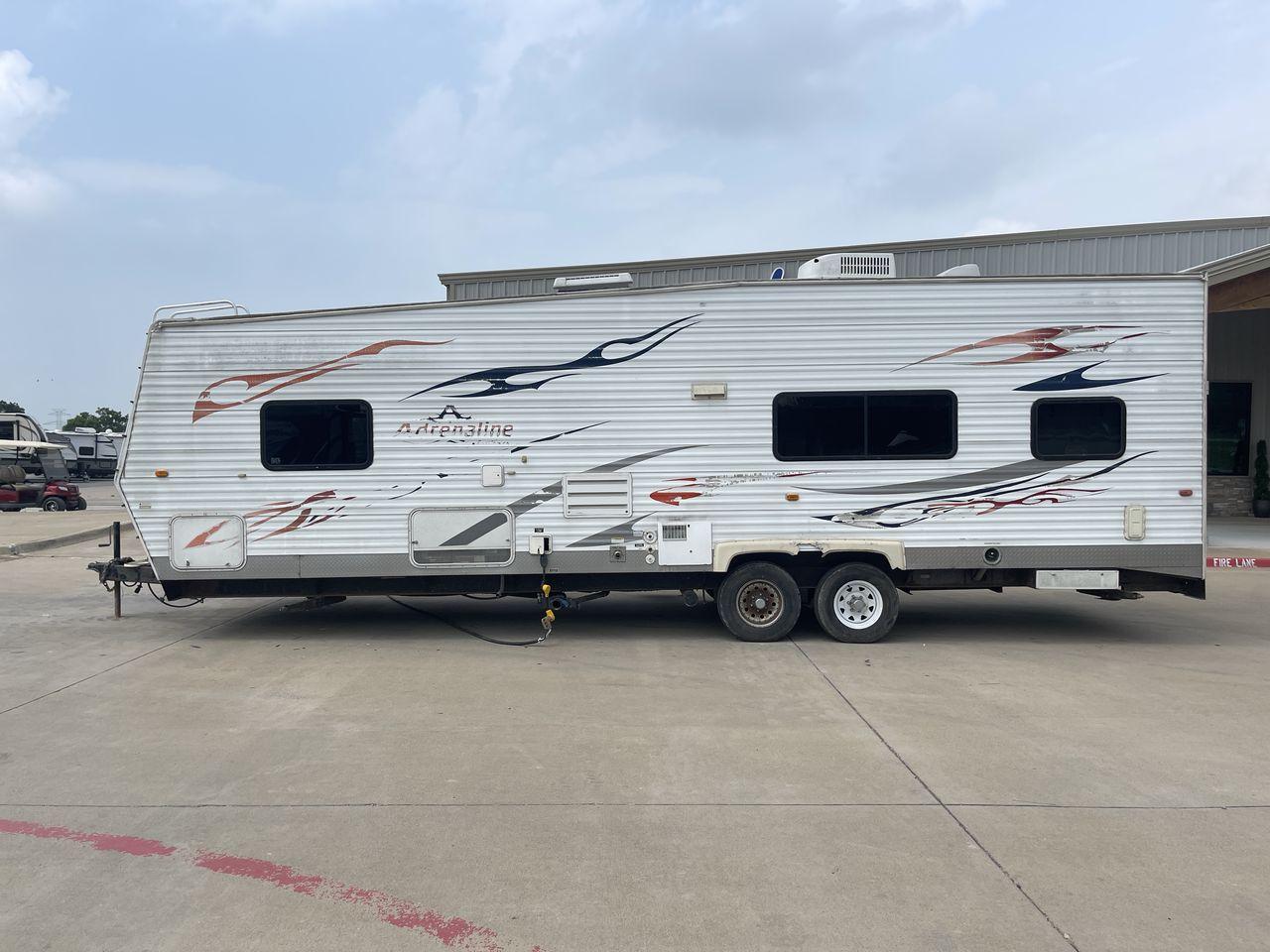 2008 WHITE ADRENALINE 23FS (1TC2B180683) , Length: 28.67 ft | Dry Weight: 6,474 lbs | Gross Weight: 9,500 lbs | Slides: 9 transmission, located at 4319 N Main Street, Cleburne, TX, 76033, (817) 221-0660, 32.435829, -97.384178 - The 2008 Adrenaline 23FS Toy Hauler is prepared for a journey! It is 28.67 feet long and weighs 6,474 pounds when dry. It's lightweight and portable, but large enough to hold all of your favorite toys and accessories. It can accommodate up to 9,500 pounds, so you'll have plenty of room for your next - Photo #24