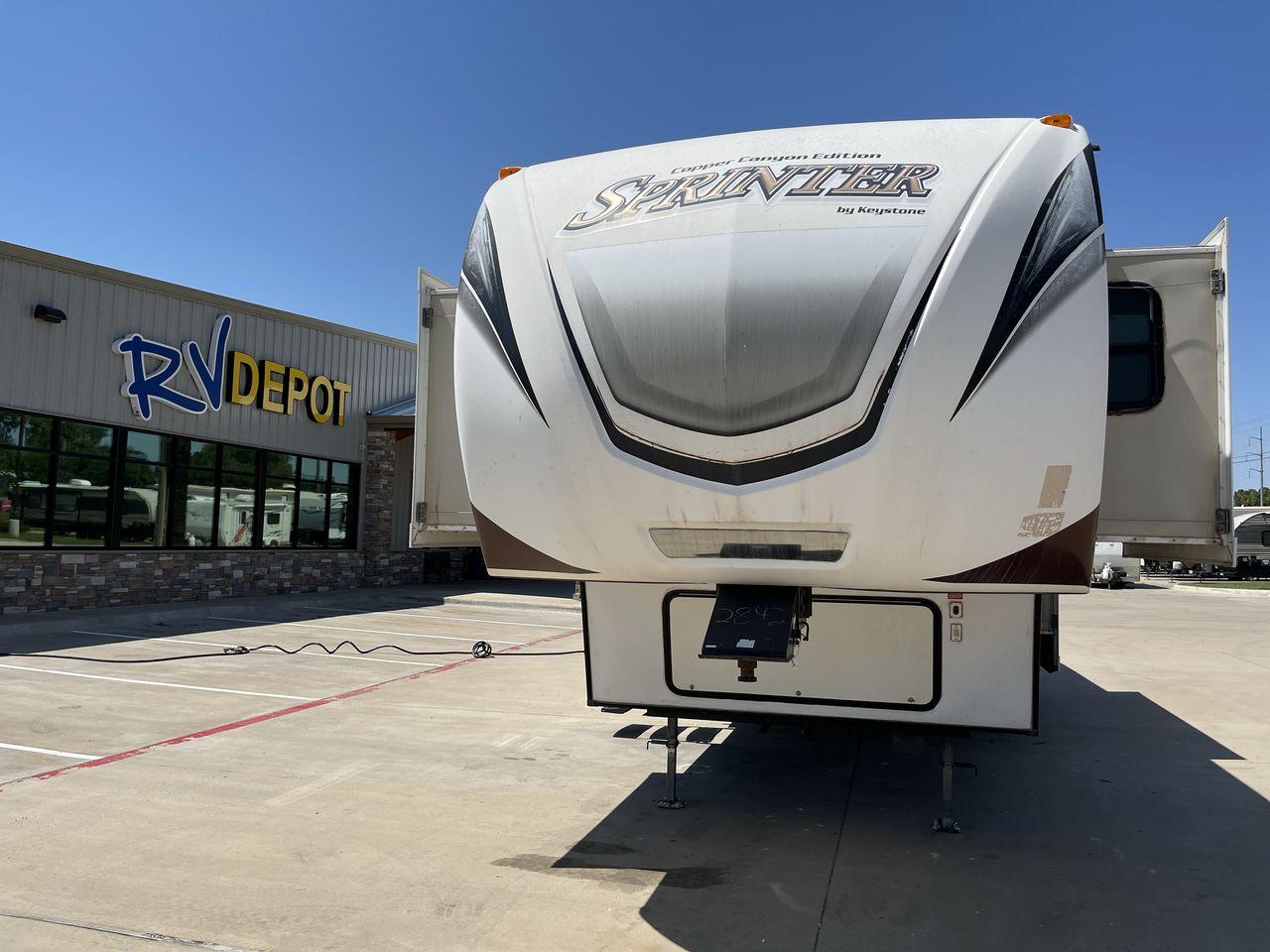 2014 WHITE KEYSTONE SPRINTER 359FWMPR - (4YDF33321E1) , Length: 37.33 ft. | Dry Weight: 9,598 lbs. | Gross Weight: 12,750 lbs. | Slides: 3 transmission, located at 4319 N Main St, Cleburne, TX, 76033, (817) 678-5133, 32.385960, -97.391212 - The 2014 Sprinter 333FWLS by Keystone luxury fifth wheel brings the spotlight to its elevated front living area floorplan with a rear private bedroom and a spacious center kitchen. It measures just 37.33 ft in length, 8 ft in width, and 12.5 ft in height. It has a base weight of 9,598 lbs with a pay - Photo #0