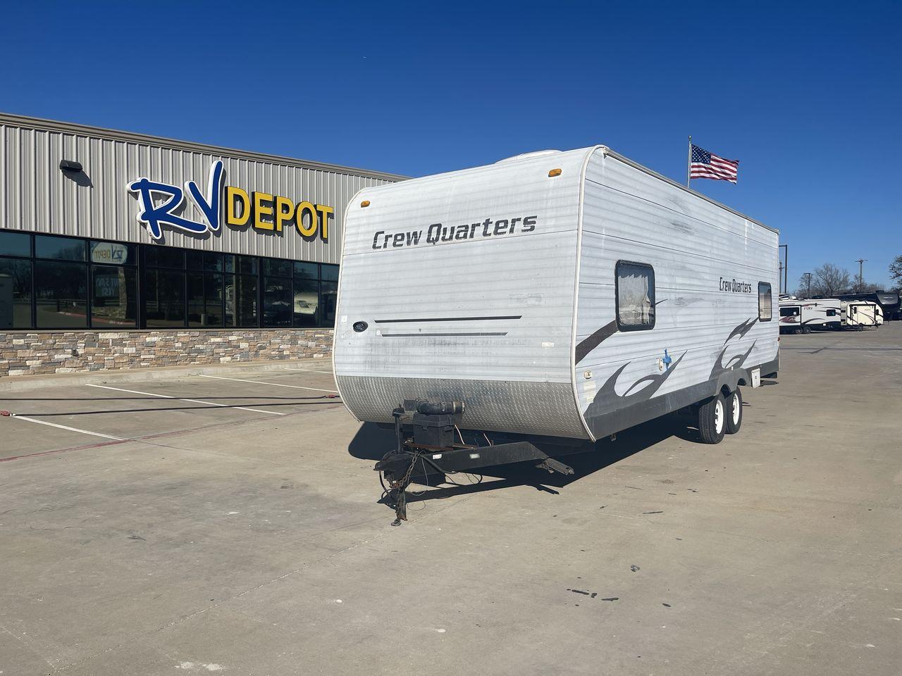 2010 WHITE FOREST RIVER CREW QUARTERS T24-2 - (4X4TWDZ21AR) , Dry Weight: 5,275 lbs | Gross Weight: 7,713 lbs | Slides: 0 transmission, located at 4319 N Main St, Cleburne, TX, 76033, (817) 678-5133, 32.385960, -97.391212 - The 2010 Crew Quarters T24-2 is a cute and cozy travel trailer that comes with lovely features that you would absolutely adore in a camper. It features a corner bunk bed with a nice window on the bottom bunk. It has a mini fridge, a microwave, and a solid surface counter space. A tall double-door ca - Photo #0