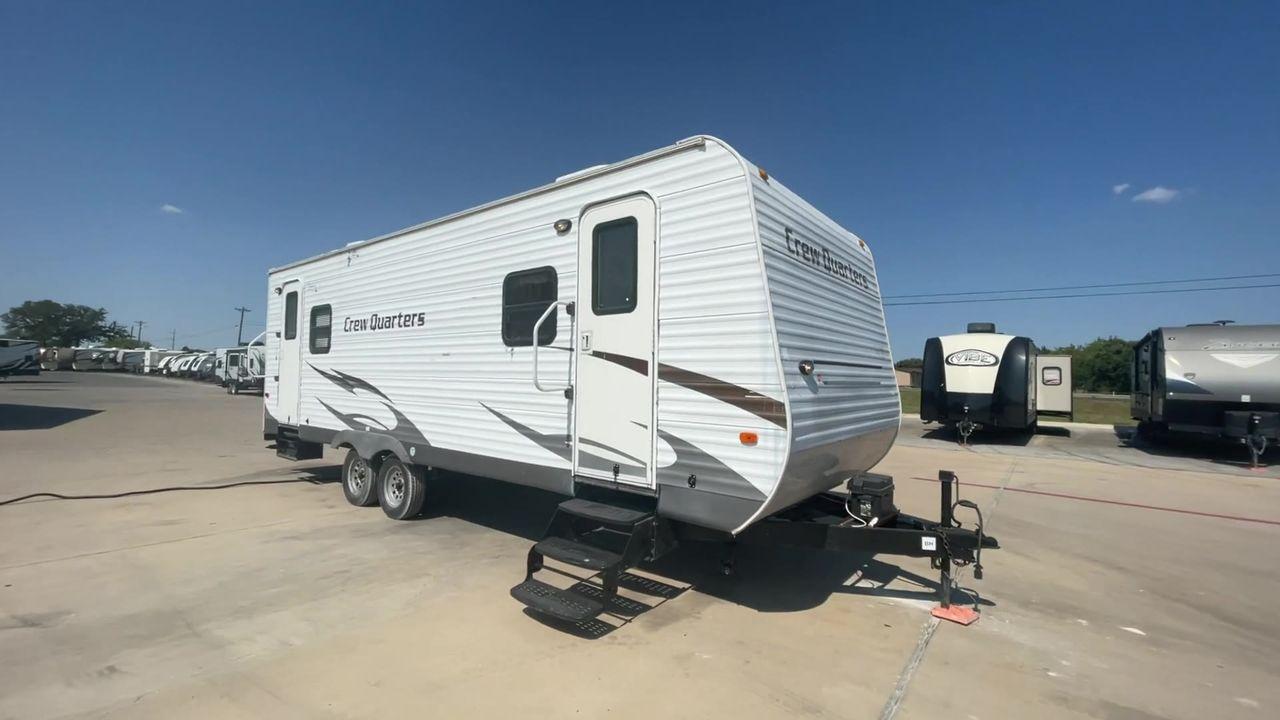 2010 WHITE FOREST RIVER CREW QUARTERS T24-2 - (4X4TWDZ21AR) , Dry Weight: 5,275 lbs | Gross Weight: 7,713 lbs | Slides: 0 transmission, located at 4319 N Main St, Cleburne, TX, 76033, (817) 678-5133, 32.385960, -97.391212 - The 2010 Crew Quarters T24-2 is a cute and cozy travel trailer that comes with lovely features that you would absolutely adore in a camper. It features a corner bunk bed with a nice window on the bottom bunk. It has a mini fridge, a microwave, and a solid surface counter space. A tall double-door ca - Photo #3
